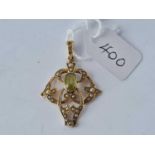 A gold, pearl and peridot pendant