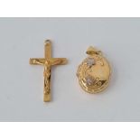 A locket and cross 9ct – 2 gms