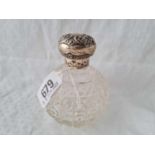 A circular scent bottle with cut glass body – Birmingham 1906