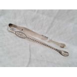 An attractive pair of George III bright cut sugar tongs by GH