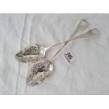 A pair of George III Berry spoons with embossed bowls, London 1814 by AB, GB