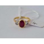 A THREE STONE RUBY AND DIAMOND RING 18CT GOLD SIZE O – 4.3 GMS