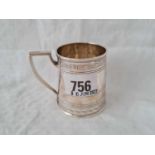 A small George III mug with reeded bands, London 1801, 80g