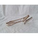 Pair of decorated asparagus tongs. 1897