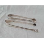 Two pairs of Georgian sugar tongs. 57Gms