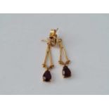 A pair f garnet drop earrings