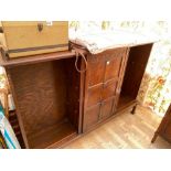 Oak 1920s side cabinet with open shelves either side of the cupboard. 59" wide
