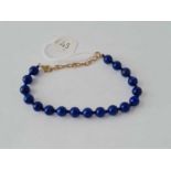 A Lapis bead bracelet with 9ct catch & links 16g inc