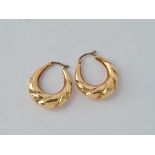 A pair of large 9ct hoop earrings 2.6g