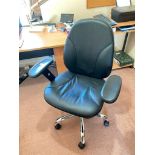 A Swivel office arm chair