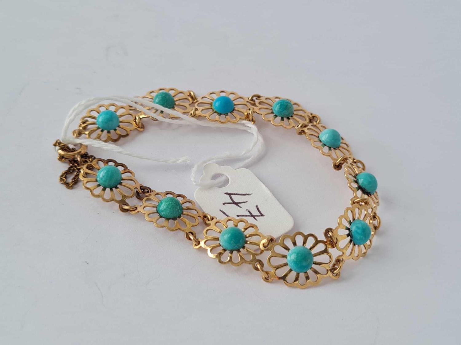 A turquoise flower design 9ct bracelet 7g inc