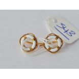 A unusual pair of earrings in the form of a lifebuoy 9ct – 1.9 gms