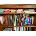 A shelf of ordnance maps and hardback books