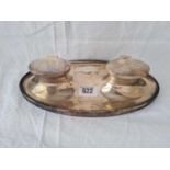 An oval two bottle ink stand with hinged covers – 10” wide – Birmingham 1924