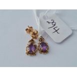 A pair of amethyst ear pendants 9ct