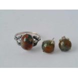 A boxed moss agate and silver ring and earring set