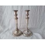 Large pair of Regency style candlesticks with decorated stems, bases and detachable nozzles.12.5”