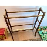 A mahogany towel rail