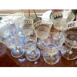Set of seven etched wine glasses and seven Champagne glasses