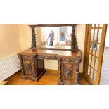 Good Victorian carved oak sideboard with mirror back. 72" wide