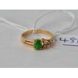 A jade set ring 18ct gold size M – 1.1 gms