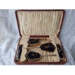 Art Deco style boxed set of brushes and mirror inset with tortoiseshell. Birmingham 1929