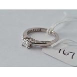 DIAMOND 18CT WHITE GOLD ‘FOREVER’ (SIGNED IN SHANK) S/S RING SET WITH A SQUARE DIAMOND WEIGHING 0.33
