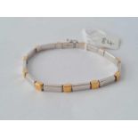 A TWO COLOUR GOLD BRACELET 18CT GOLD – 9.4 GMMS