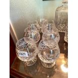 A set of seven cut brandy glasses