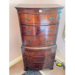 A small reproduction tall boy chest in two sections with six long drawers, brush and slide, 23"