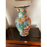 Oriental vase decorated with flowers. 20" high,