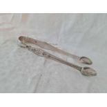 Pair of George III brightcut sugar tongs. Exeter by R F