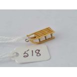 A sled charm 18ct gold – 1.3 gms