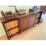 A mahogany low bookcase with cupboards and shelves, 60" wide