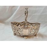 A pierced Victorian basket embossed with scrolls and swing handle – 5.5” wide – Sheffield 1896 by JR