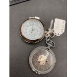 A unusual black faced skeleton pocket watch AF and modern pocket watch