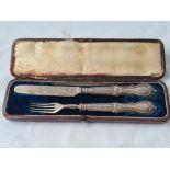 A boxed christening set of a mounted knife and fork – Sheffield 1863 by IH