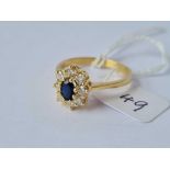 GOOD QUALITY SAPPHIRE & DIAMOND OVAL CLUSTER RING, IN 18CT GOLD, TOTAL DIAMOND CONTENT 0.70 CTS,