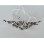 A PRETTY DIAMOND HEART AND WINGS BROOCH