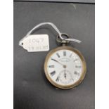 A gents silver pocket watch with maritime scene to rear with seconds dial no glass face