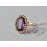 A LARGE EDWARDIAN AMETHYST AND PEARL RING 9CT SIZE T – 6.8 GMS