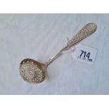 A Victorian sugar sifter spoon chased with scrolls, London 1872 by RM, EH, 54g