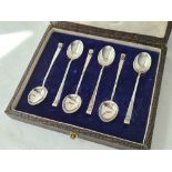 A box set of six coffee spoons with turn over stems, Birmingham 1922 by H & H