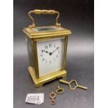 Another brass carriage clock with swing handle, 6" high