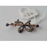 A GOOD VICTORIAN GOLD SAPPHIRE AND DIAMOND RIBBON BROOCH 5.2 GMS