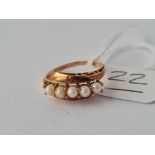 A five stone pearl ring 14ct gold size K 1.9 gms