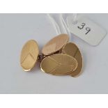 A pair of oval cufflinks 9ct 7 gms