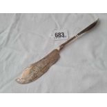 A sterling silver ascetic period butter knife, engraved with a lily, stamped Cauldweell, 42 g.