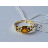 A citrine and diamond three stone ring 18ct gold size S 3.6 gms