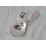 A plain fiddle pattern caddy spoon with mark to bowl, Sheffield 1978
